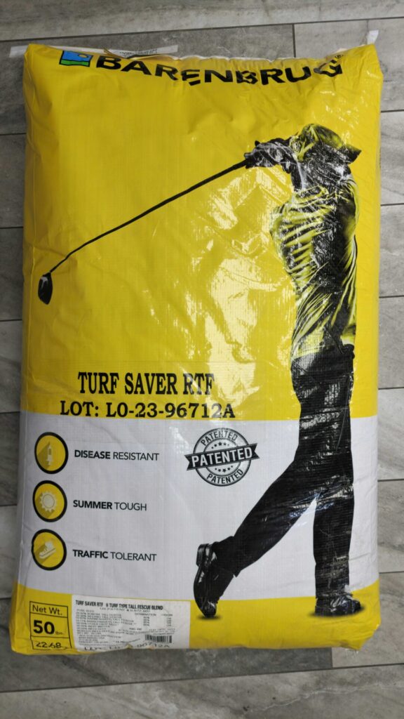 A yellow bag of Barenbrug Turf Saver RTF. It features a silhouette of a person golfing and describes the product as disease-resistant, summer-tough, and traffic-tolerant.